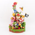 Super Mario all‑stars diorama statue