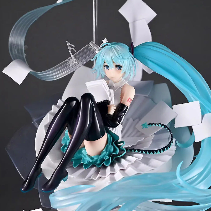 Hatsune Miku music note sheet effect sitting figure