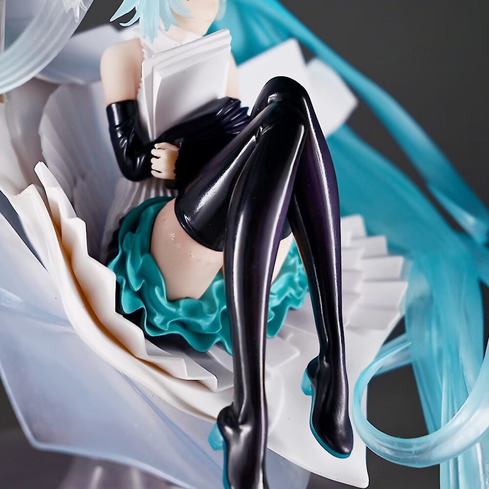 Hatsune Miku music note sheet effect sitting figure